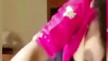XXX affair of amazing Desi woman in sari who takes boobies out at home