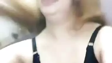 Cute girl making video for lover