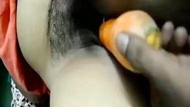 Desi bhabhi inserting carrot in pussy