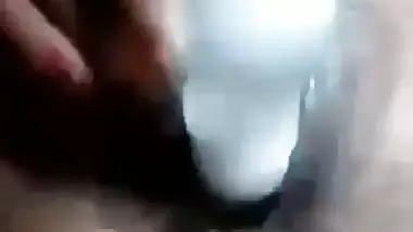 Desi nude girl fucks her pussy with a plastic bottle