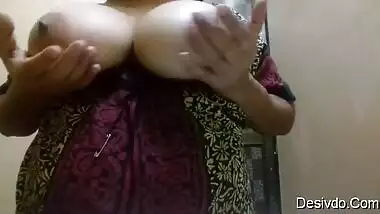 Desi mom self records her boobs press for her bf..son gets this video from her mobile