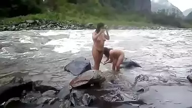 Two fat Desi women show their XXX assets while relaxing naked in river