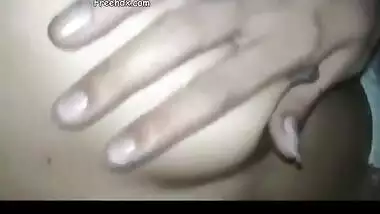 Desi girl pulls up her T-shirt and sex lover feels her XXX boobs