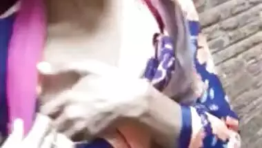 Adorable Desi cutie flashes curious friend her XXX tits in public