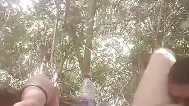 Mistress lets her servant lick her pussy during outdoor sex