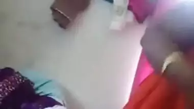 Fatty Indian woman takes off orange dress to join husband for sex