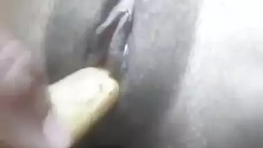 Desi girl masturbating pussy with a stick