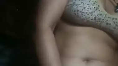 Bhabi masturbating and talking on phone